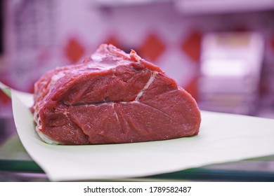 Fresh Raw Meat Isolated Over The Butcher's Counter