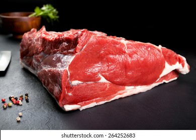 Fresh And Raw Meat. Ribeye. Fresh Whole Piece Of Steak On Black Background Blackboard