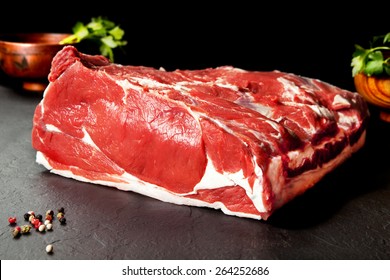 Fresh And Raw Meat. Ribeye. Fresh Whole Piece Of Steak On Black Background Blackboard