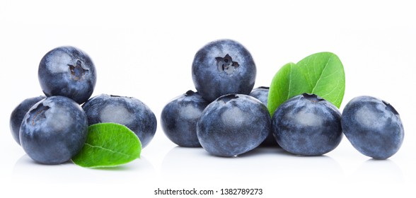 Fresh raw organic blueberries in vintage wooden box on kitchen background. - Powered by Shutterstock