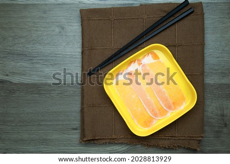 fresh raw pork, meat ,beef, belly, sliced on square plate  on wood, wooden background,set shabu, hot pot ingredients.