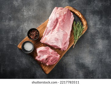 Fresh Raw Pork Neck With Salt And Pepper, Overhead Shot. Pork Neck Meat On A Wooden Board Top View. 