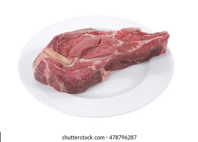 Fresh Raw Red Ribeye Beef Steak On Bone Over Big White Plate Isolated On White Background Rib Eye