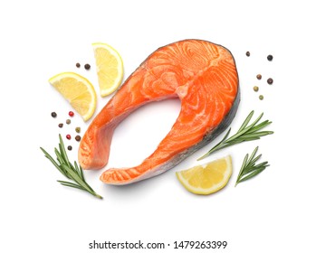 Fresh Raw Salmon Steak With Rosemary And Lemon On White Background, Top View