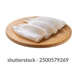 Fresh raw squid or cuttlefish fillet on cutting board isolated on a white background.