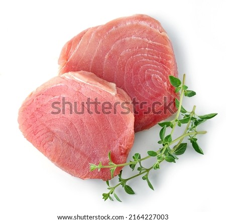 fresh raw tuna steak isolated on white background, top view