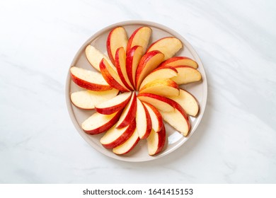 Fresh Red Apple Slice On Plate