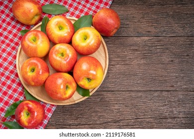 Fresh Red Apple In Wooden Plate On Wooden Background, US. Red Envy Apple On Wooden Table.