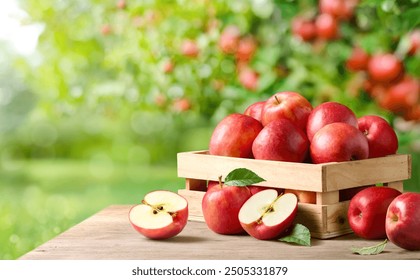 Fresh red apples with cut in half on wooden table in apple farming. - Powered by Shutterstock