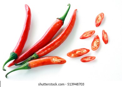 Fresh Red Chilli Delicious Savory Slices On A White Background.