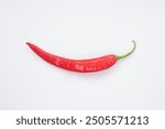 Fresh red chilli pepper on white background. File contains clipping paths. Closeup top view red chili pepper with sliced, raw food ingredient concept. Red hot chili peppers isolated, selective focus.