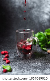 Fresh Red Drink Raspberry Berries And Green Basil Mint Beverage Cocktail Or Tea Cold With Ice Trend Meal Copy Space Food Background Rustic. Top View