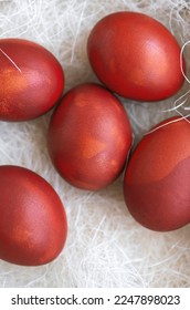 Fresh red eggs and some straw in a wooden crate on a white background. Chicken eggs. Easter concept .Top view - Shutterstock ID 2247898023