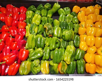 Fresh red, green and yellow bell peppers background at Queen Victoria Market in Melbourne  - Shutterstock ID 1654225198