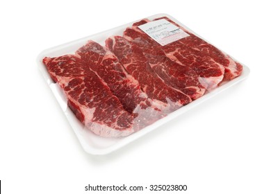 Fresh red meat packed in a poly bag. 