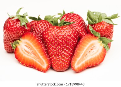 Fresh red strawberry stack on a white background - Shutterstock ID 1713998443