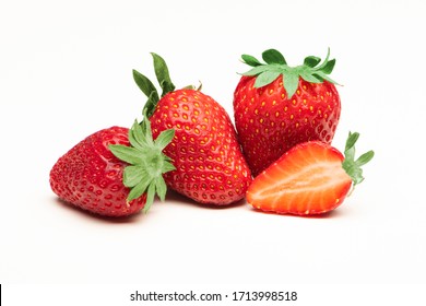 Fresh, red and tasty strawberries isolated on a white background - Shutterstock ID 1713998518