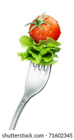 Fresh Red Tomato And Salad On A Fork. Isolated