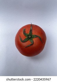 Fresh Red Tomatoes Isolated On White Background. The Tomato Is Consumed In Diverse Ways, Raw Or Cooked, In Many Dishes, Sauces, Salads, And Drinks. Selective Focus