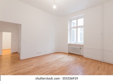 Fresh Renovated Room With Wooden Oak Floor, White Walls And Window