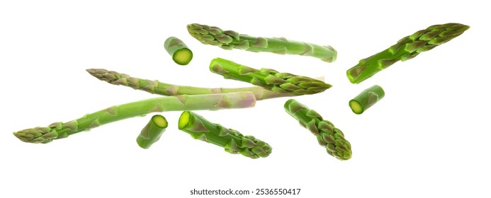 Fresh ripe asparagus in air on white background