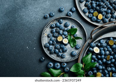 Fresh ripe blueberries in a metal bowl. Berry background. Fresh blue berries.