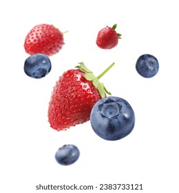 Fresh ripe blueberries and strawberries falling on white background - Powered by Shutterstock