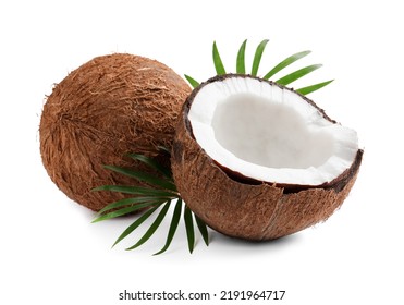 Fresh ripe coconuts with green leaves on white background - Shutterstock ID 2191964717