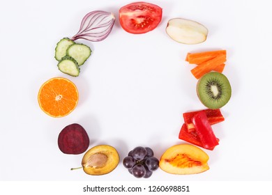 Fresh ripe fruits and vegetables on white background. Healthy lifestyles and nutrition concept
