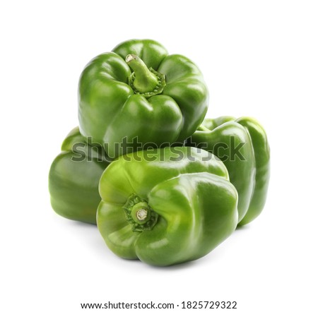 Fresh ripe green bell peppers isolated on white