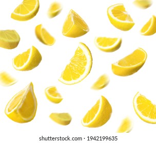 Fresh Ripe Lemons Falling On White Background