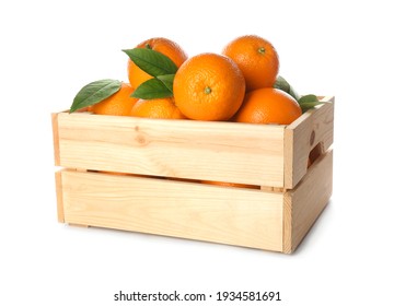 Fresh ripe oranges with green leaves in wooden crate on white background - Shutterstock ID 1934581691