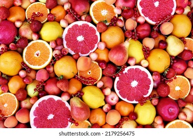 Fresh ripe organic fruits from market: pear and orange, grapefruit and lemon, apricot and berries - Powered by Shutterstock