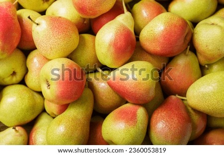 fresh ripe pears as background, top view