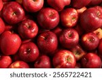 Fresh ripe red apples as background, top view