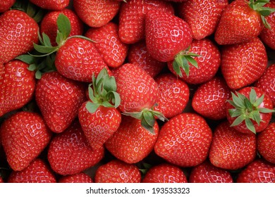 fresh ripe strawberries background, shot directly above - Shutterstock ID 193533323