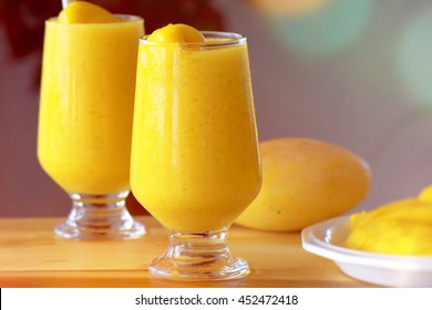 Fresh ripe sweet mango smoothie and ice cream mango with bokeh background