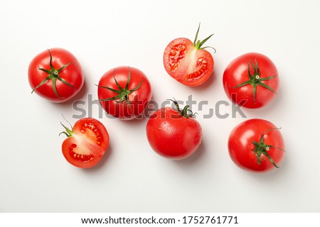 Fresh ripe tomatoes on white background, top view