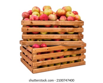 Fresh ripe yellow and red apples in wooden boxes, isolated on a white background