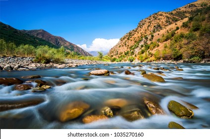 Fresh River Water Stream Flow In Mountain Landscape