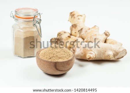 Fresh roots and ginger powder - Zingiber officinale; photo on neutral background [[stock_photo]] © 