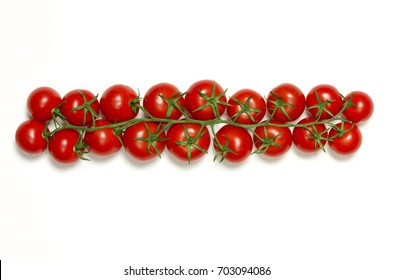 Fresh Row Of Vine Tomatoes Isolated On White