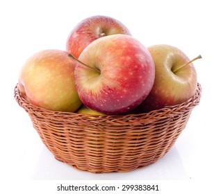 Fresh Royal Gala Apples In A Basket, Isolated On White