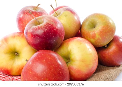 Fresh Royal Gala Apples On A Burlap Bag, Isolated On White