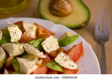 Fresh Salad With Avocado, Tomato And Mozzarella