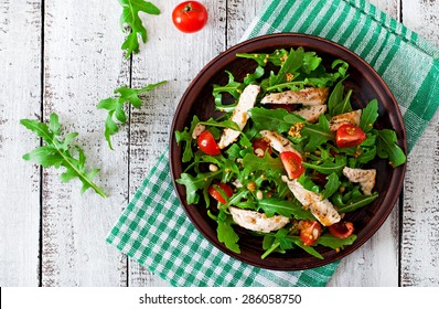 Fresh Salad With Chicken Breast, Arugula And Tomato. Top View