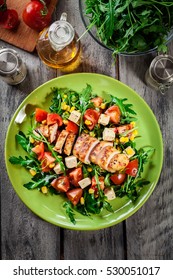 Fresh Salad With Chicken Breast, Arugula And Tomato On A Plate