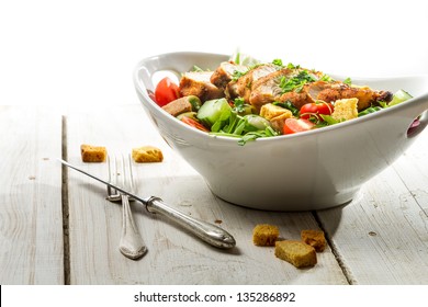 Fresh Salad With Chicken On White Background