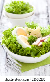 fresh salad with egg and ham