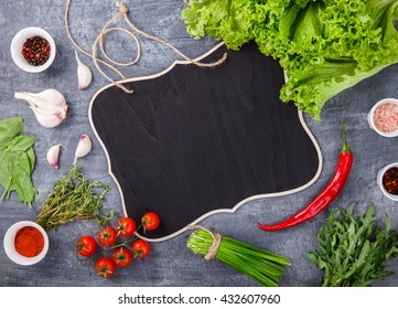 Fresh salad greens of lettuce with spices and fresh vegetables.Vegetarian and healthily cooking concept.Copy space.selective focus - Shutterstock ID 432607960
